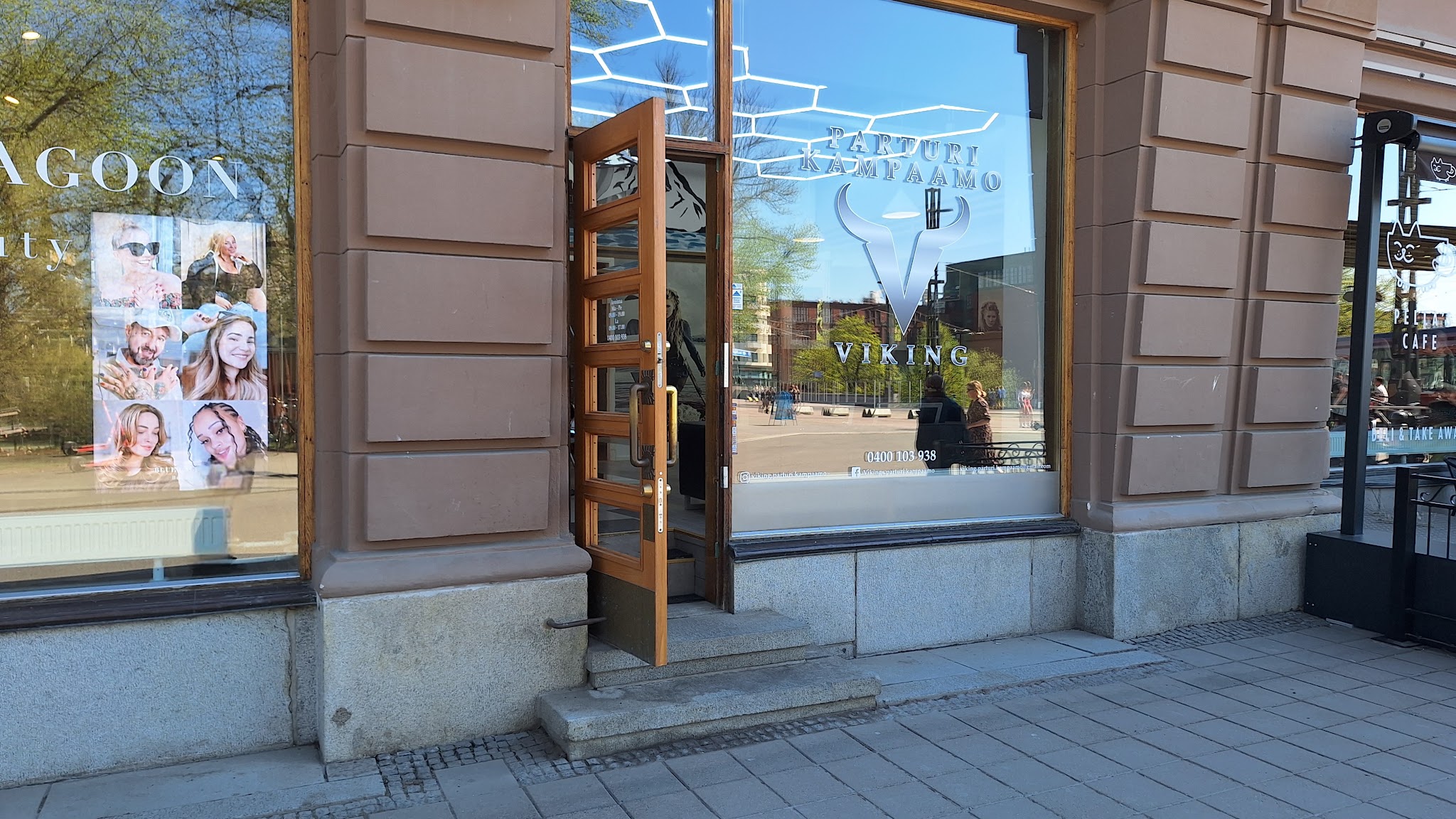 The street-facing shop entrance with its door open.